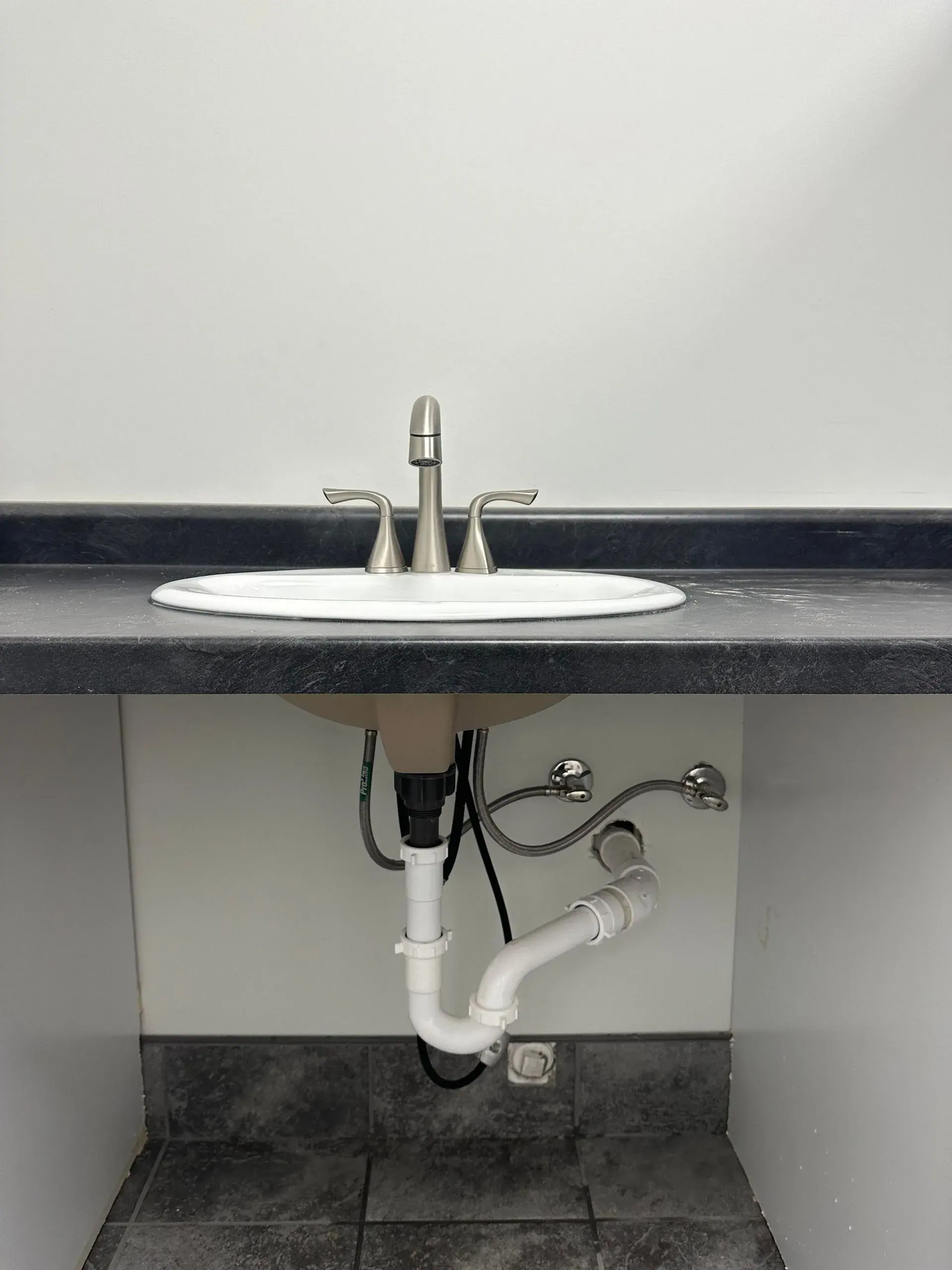 Exposed Plumbing Vessel Sink
